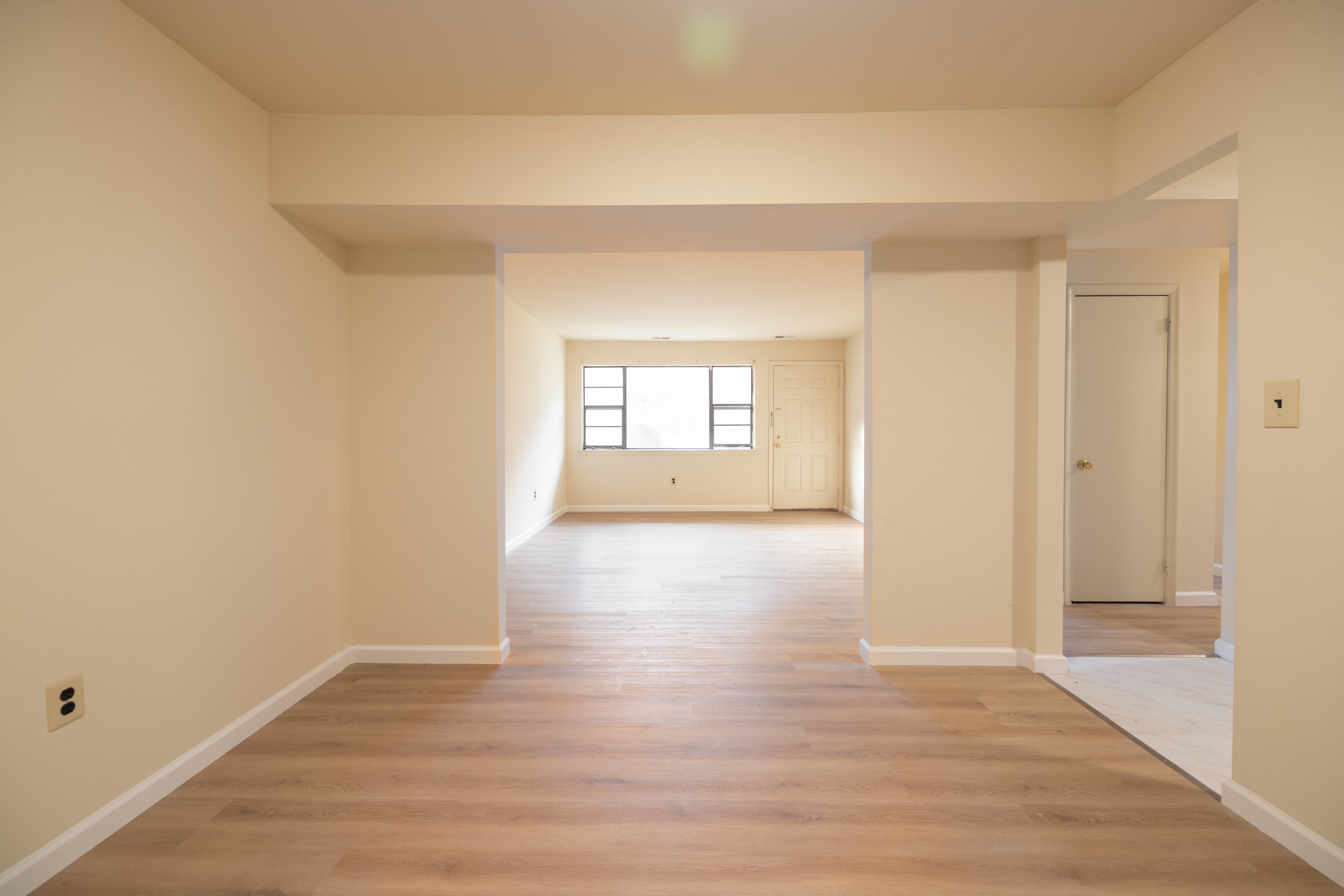 Spacious living room with hardwood floors